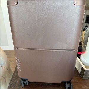 Brown Rolling Suitcase